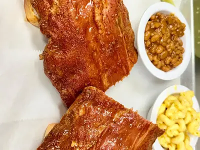 Dry-rubbed smoked ribs with baked beans and mac and cheese